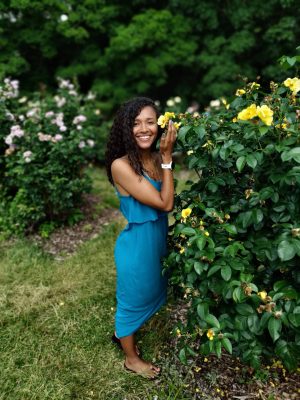 Claire Ellerbrock with yellow flowers